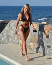 Amber TurnerSexy in Amber Turner Sexy enjoys the sun by the pool in Crete, Greece