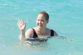 Amy Schumer Sexy in Amy Schumer enjoying Christmas day at the beach with her family in St. Barths