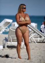 ANASTASIAKVITKOSEXYINAGOLDSWIMSUITWITHTHONGBOTTOMSATTHEBEACHINMIAMI - NUDE STORY