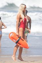  alt="Olivia Dunne Sexy in Olivia Dunne Sexy Shows Off Her Sizzling Body In A Spicy Red Swimsuit While Filming The Baywatch Reboot In La"