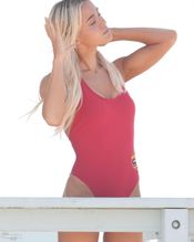  alt="Olivia Dunne Sexy in Olivia Dunne Sexy Shows Off Her Sizzling Body In A Spicy Red Swimsuit While Filming The Baywatch Reboot In La"