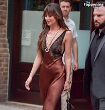 Dakota JohnsonSexy in Dakota Johnson Sexy Dazzles In A Hot Copper Silk Gown As She Leaves A Hotel In New York City