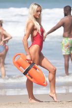 alt="Olivia Dunne Sexy in Olivia Dunne Sexy Shows Off Her Sizzling Body In A Spicy Red Swimsuit While Filming The Baywatch Reboot In La"