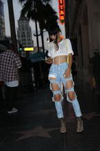 Bai LingSexy in Bai Ling Braless in A White Top And Ripped Jeans in Los Angeles