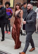 Dakota JohnsonSexy in Dakota Johnson Sexy Dazzles In A Hot Copper Silk Gown As She Leaves A Hotel In New York City