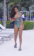 REBECCASCOTTRELAXESBYTHEBEACHANDSUNLOUNGERATHERLUXURYHOTELINMIAMI - NUDE STORY