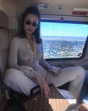 Bella Hadid Poses in A White Top And  Bra 