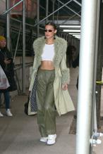 Bella HadidSexy in Bella Hadid goes braless under a see-through white top while arriving at the Marc Jacobs show in New York City