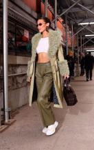 Bella HadidSexy in Bella Hadid goes braless under a see-through white top while arriving at the Marc Jacobs show in New York City