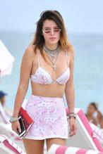 Bella ThorneSexy in Bella Thorne suffers a few scratches while trying to take her dog out of the water in Miami