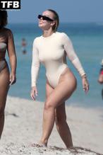 Bianca ElouiseSexy in Bianca Elouise and  pal Yes Julz show off their curves as they hit the beach in Miami 