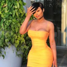 Blac Chyna Sexy Poses in A Yellow Dress In A Social Media Shoot