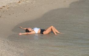 Brooke Burke CharvetSexy in Brooke Burke Sexy Perfect Body in A B&W Swimsuit On the Beach in St Barths