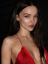  alt="Dove Cameron Sexy in Dove Cameron Sexy Shows Off Her Hot Cleavage And Legs In A Spicy Red Dress For Diesel's Fragrance Campaign Photoshoot"