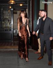 Dakota JohnsonSexy in Dakota Johnson Sexy Dazzles In A Hot Copper Silk Gown As She Leaves A Hotel In New York City