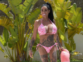 Katie Price Sexy in Katie Price Sexy Spotted Topless And Showing Off Her Sizzling Assets In Hot Pink Bikini
