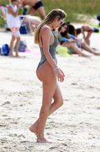 Candice Swanepoel Sexy showing off her summer bod in a racy one-piece swimsuit
