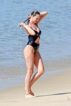 Candice Swanepoel Sexy in one-piece swimsuit  on  the beach in Victoria, Brazil