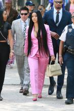 Cardi BSexy in Cardi B in a pink business suit with her cleavage busting out of her top