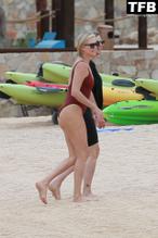 Charlize TheronSexy in Charlize Theron Sets Pulses Racing in A Red Hot One-Piece Swimsuit