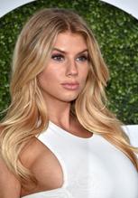 Charlotte McKinneySexy in Charlotte McKinney Sexy in A White Dress at GQ Men of the Year Party