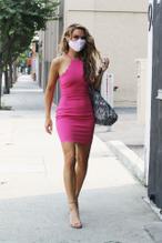 Chrishell Stause Sexy in Chrishell Stause arrives at the DWTS studio in a hot pink dress in Los Angeles