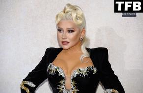 Christina AguileraSexy in Christina Aguilera Sexy Seen Showing Off Her Deep Cleavage At The amfAR Gala in Cannes 