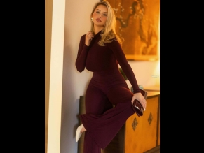 alt="Mikayla Demaiter Sexy in Mikayla Demaiter Sexy Photoshoot Posing Her Curvaceous Body In A Tight Burgundy Jumpsuit"