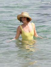 Gemma ArtertonSexy in Gemma Arterton Stuns In A Sexy Yellow Swimsuit At Exclusive Beach Party In Italy