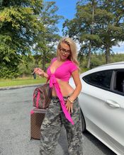 Tallia Storm Sexy Photos Showing Off Her Hot Pokies In A Striking Pink Top