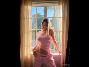  alt="Joy Corrigan Sexy in Joy Corrigan Sexy Shows Off Her Sultry Pokies And Abs In Pink Outfit"