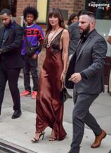 Dakota JohnsonSexy in Dakota Johnson Sexy Dazzles In A Hot Copper Silk Gown As She Leaves A Hotel In New York City