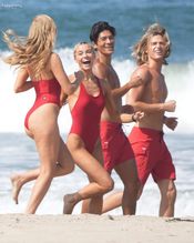  alt="Olivia Dunne Sexy in Olivia Dunne Sexy Shows Off Her Sizzling Body In A Spicy Red Swimsuit While Filming The Baywatch Reboot In La"