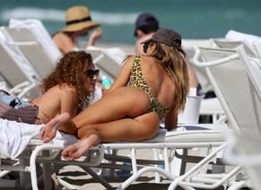 Doutzen KroesSexy in Doutzen Kroes wears a leopard print swimsuit as she hits the beach with husband Sunnery James in Miami