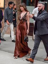 Dakota JohnsonSexy in Dakota Johnson Sexy Dazzles In A Hot Copper Silk Gown As She Leaves A Hotel In New York City