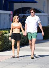 Ellie GouldingSexy in Ellie Goulding wears a bandeau bikini top as she takes a walk with husband Caspar Jopling in Miami on New Year's Day