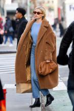 Elsa HoskSexy in Elsa Hosk Braless in a brown teddy down coat in New York City