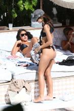 Emily RatajkowskiSexy in Emily Ratajkowski shows off her tiny bikini while hanging out poolside with friends