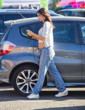 Emily RatajkowskiSexy in Emily Ratajkowski stopping for a wholesome juice drink with a friend in LA