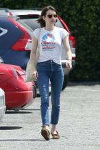 Emma RobertsSexy in Emma Roberts hits the Los Feliz neighborhood of Los Angeles donning a braless white tee blue jeans ensemble