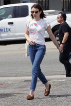 Emma RobertsSexy in Emma Roberts hits the Los Feliz neighborhood of Los Angeles donning a braless white tee blue jeans ensemble