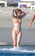 Emma RobertsSexy in Emma Roberts and Glee star Chord Overstreet were enjoying some downtime with friends in Punta Mita, Mexico