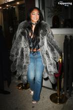 SaweetieSexy in Saweetie Sexy Flashes Her Hot Cleavage In A Sensational Fur Coat At Mulberry Bar In New York