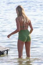 Hailey BaldwinSexy in Hailey Baldwin soaks up the sun in a sexy green checkered two-piece in Miami during a shoot