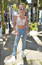 Hailey BaldwinSexy in Hailey Baldwin Sexy White Top at the Levi's Coachella Brunch in Palm Springs