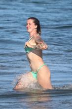 Ireland BaldwinSexy in Ireland Baldwin looks stunning in a bikini while out with friends on the beach in Malibu