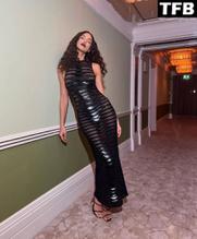 Irina ShaykSexy in Irina Shayk Sexy Shows Off Her Hot Figure in a See-Through Black Dress at British Vogue Dinner in London 