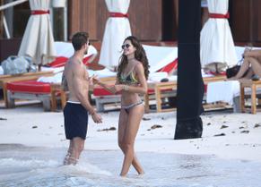 Izabel GoulartSexy in Izabel Goulart Sexy in a thong bikini with boyfriend at the beach in St. Barts