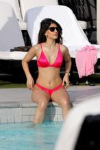 Jasmin WaliaSexy in Jasmin Walia in a pink bikini as she catches some sun during some downtime while visiting Los Angeles for work