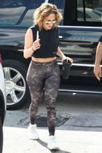 Jennifer LopezSexy in Jennifer Lopez arrives at the gym with a new hairstyle holding a personalized GUESS tumbler in Miami